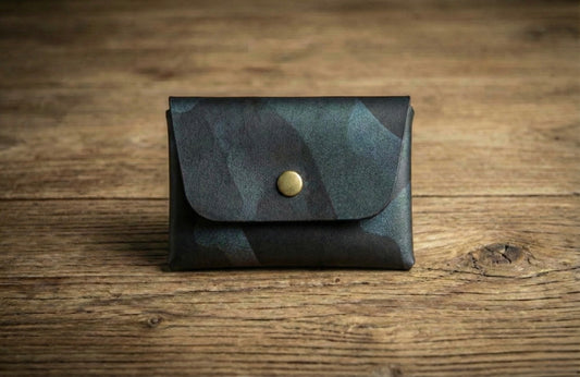 Stitchless Handmade Leather Wallet - EDC Leather Wallet in black camo color with brass snap button, displayed on wooden surface.